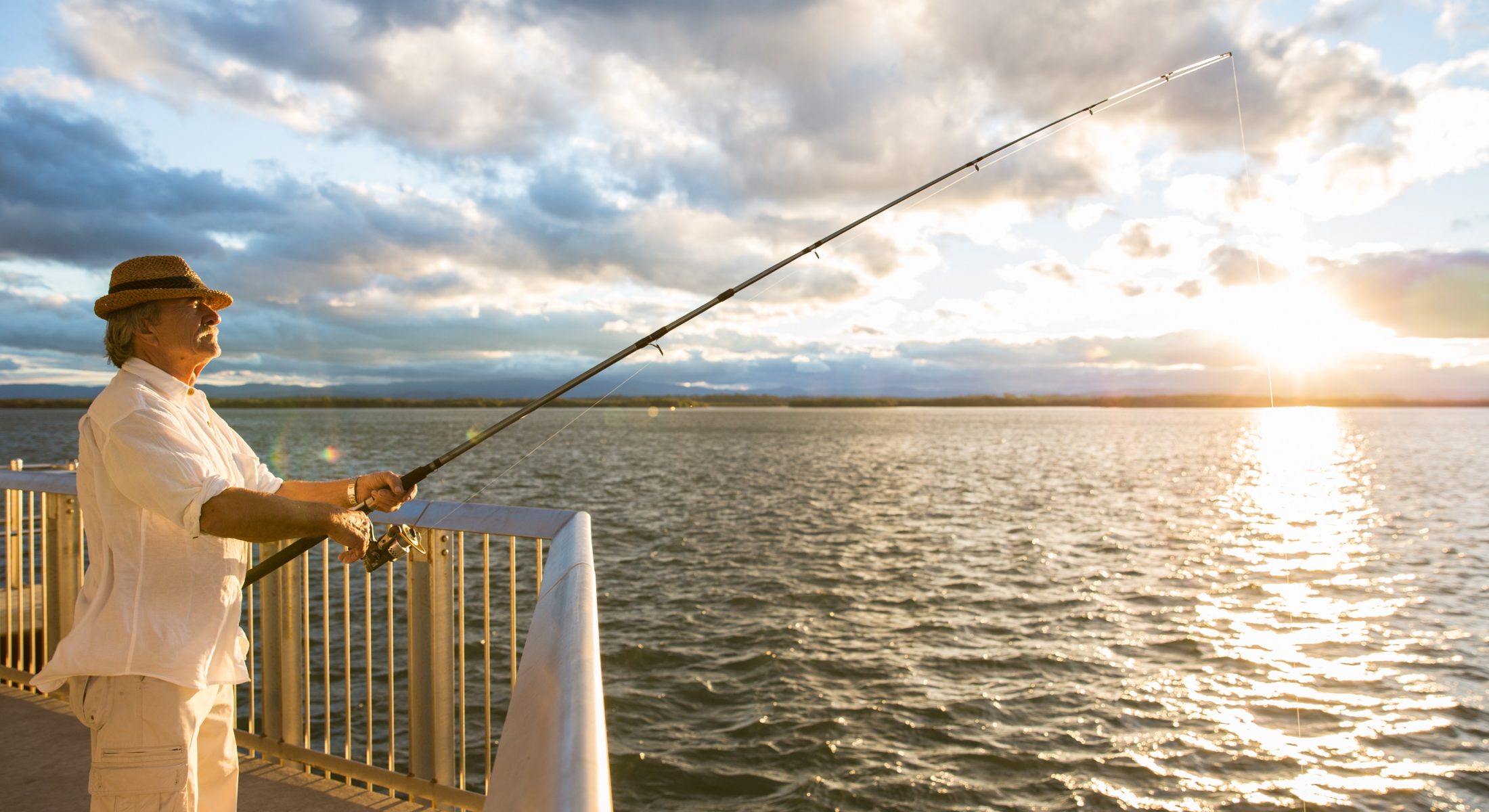 Older Man Fishing In Redcliffe Moreton Bay Region